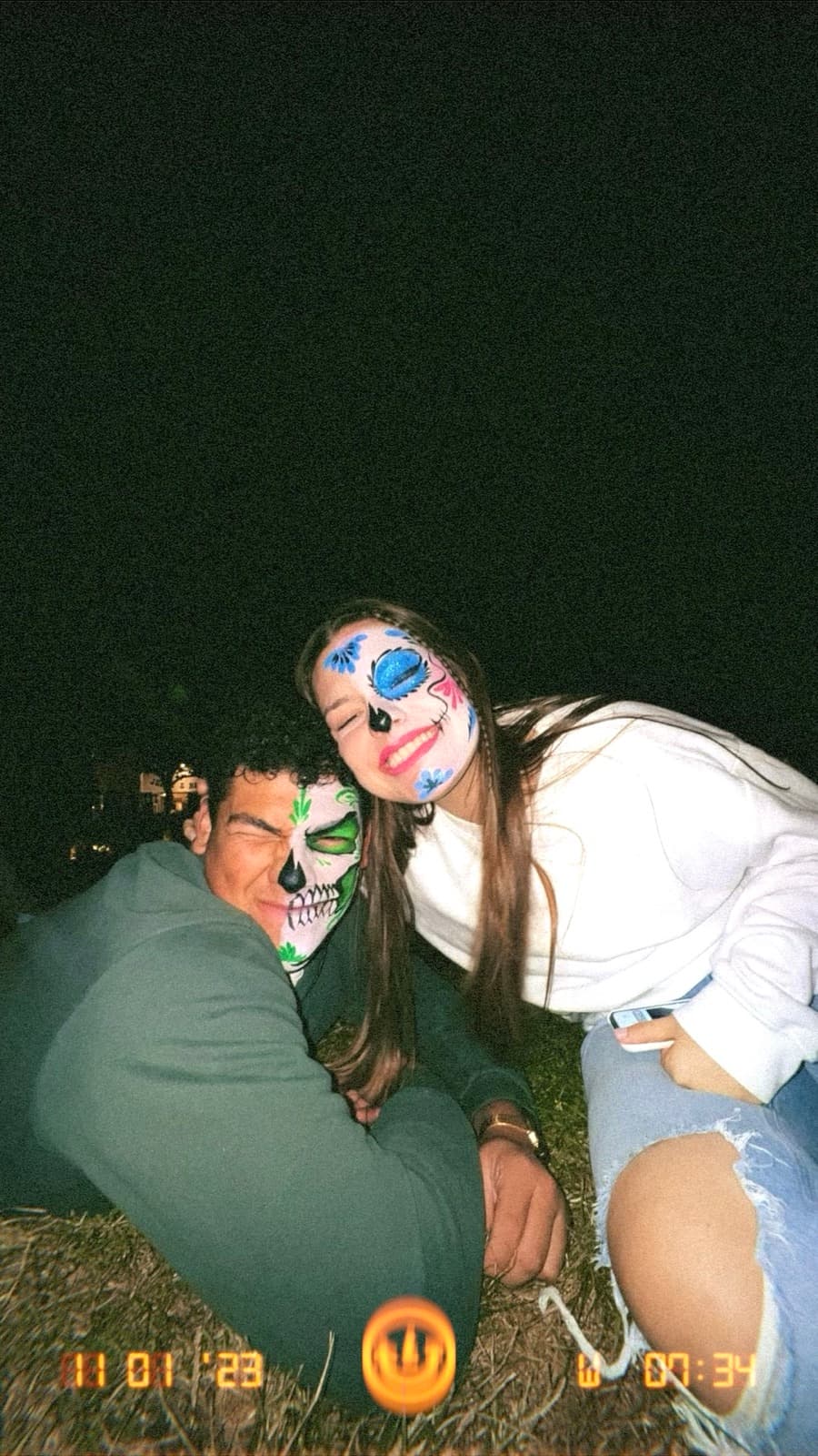 Nati and Omar in Día de los Muertos face paint